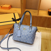 COAC  H handbag with crossbody belt  with folding box 184