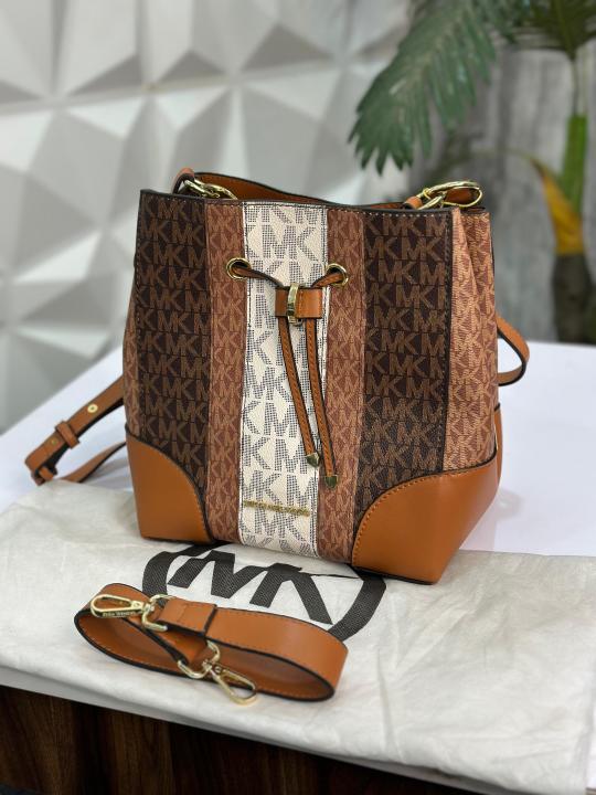 MICHAEL KOR S BUCKET BAG WITH DUST COVER