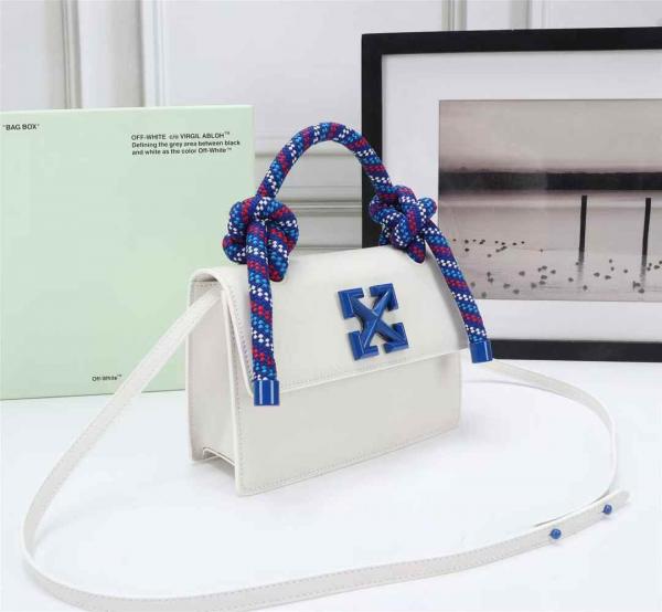 Off White Leather Insert Gummy white with Metallic Blue Arrows At Front. Rope Handle Jitney 1.4 Shoulder Bag (D88532 White)