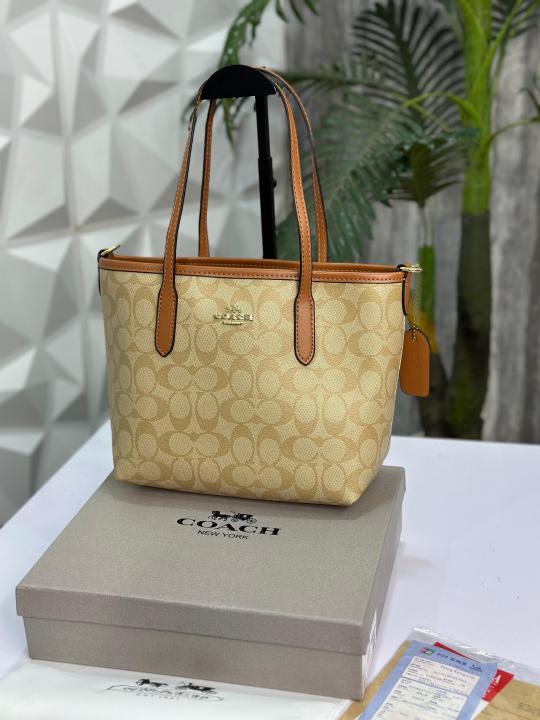 COAC H MINI TOTE WITH OG BOX AND BILLS 1017