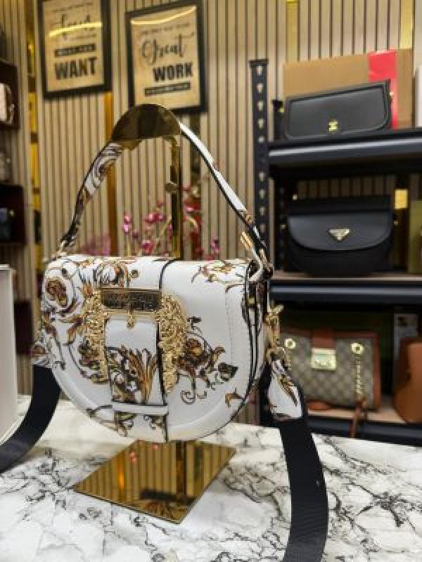 Versace shoulder bag in gold accents with magnetic closure bag (White and gold)