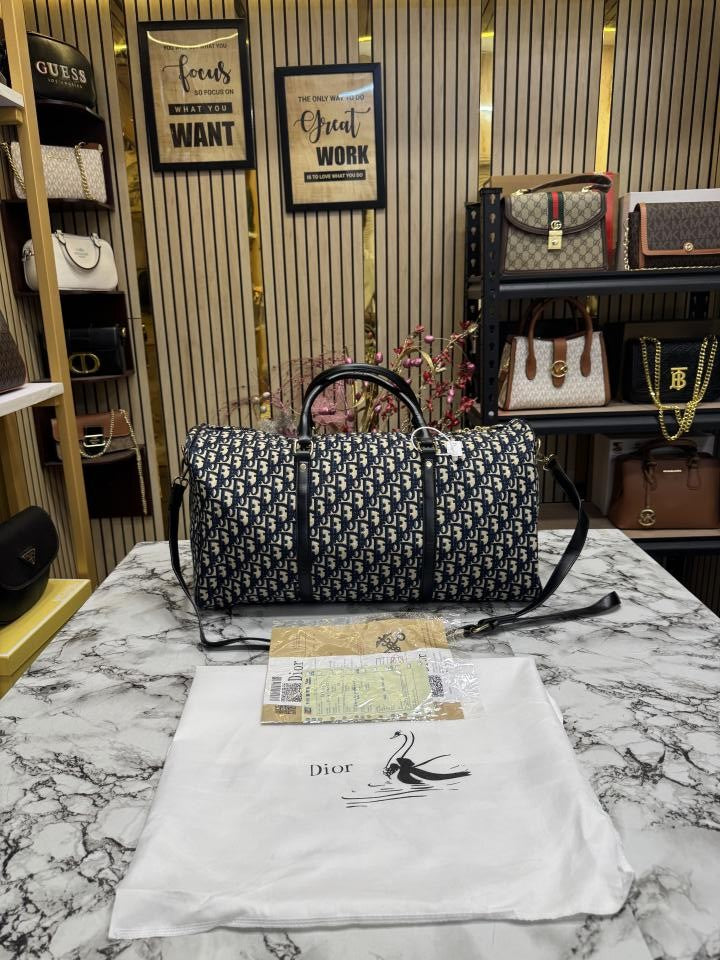 CHRISTIAN DIO R DUFFLE PREMIUM QUALITY WITH DUST BAG SLING AND TAG (BLUE) (S20)