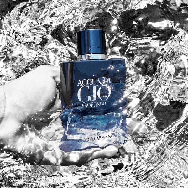 Perfume bottle of Acqua di Giò Profondo by Giorgio Armani on a water background