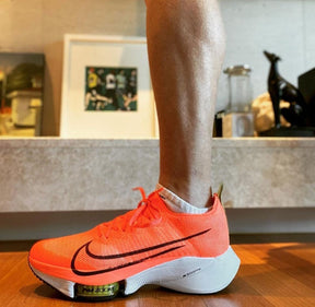 Air zoom tempo next orange