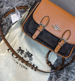 Coac  h Lucy Crossbody In Signature Canvas With folding box 249