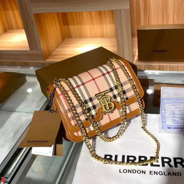 BURBERR Y MONOGRAM SLING WITH OG BOX DUST BAG AND BILLS 1016
