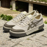 Asicss court trail army green white