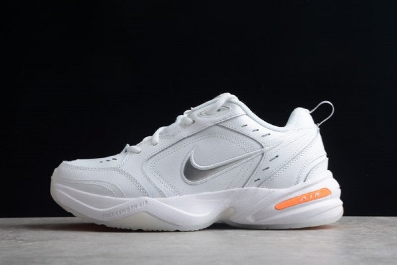 Nikee Air monarch iv snow day white total orange metallic silver