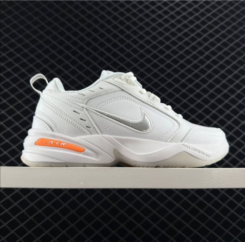 Nikee Air monarch iv snow day white total orange metallic silver