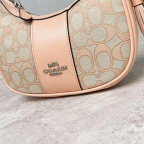 Coach  Carmen  Mini  Crossbody  In  Signature  Jacquard  Light  Apricot  Cloth  With  Pink  With  OG  Box  &  Dust  Bag  (2750)