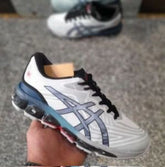 Asics Gel Quantum 360 trainers in white and blue