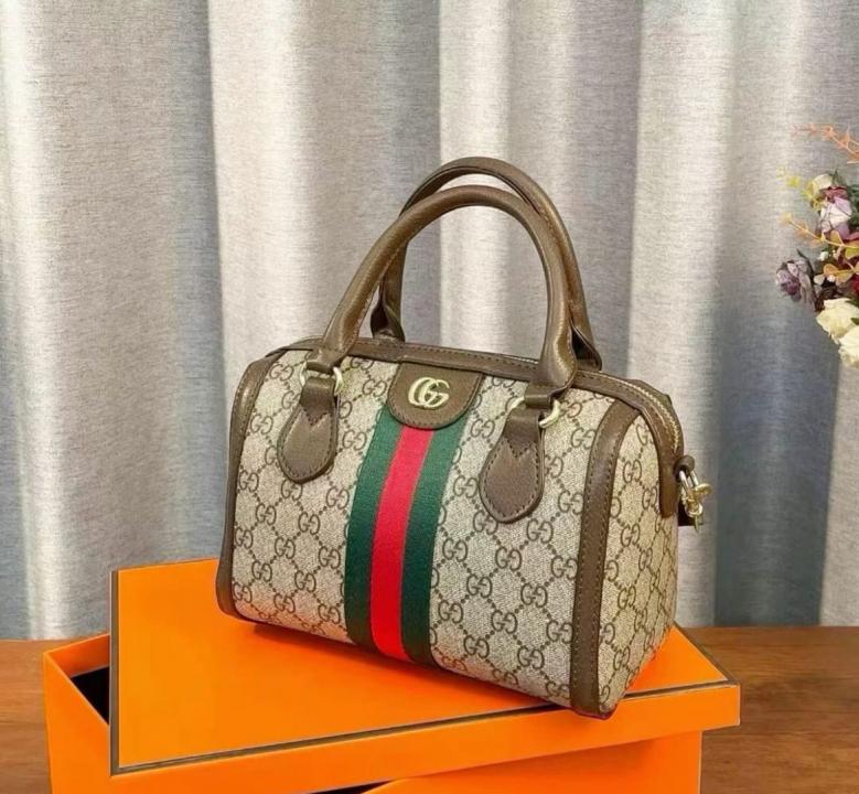 Gucci  speedy  mini  bag  with  dust  and  carry  bag(866)