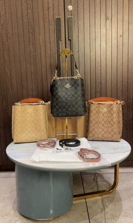 Coac  h mollie signature bucket bag with extra long sling and carry bag & OG box 477