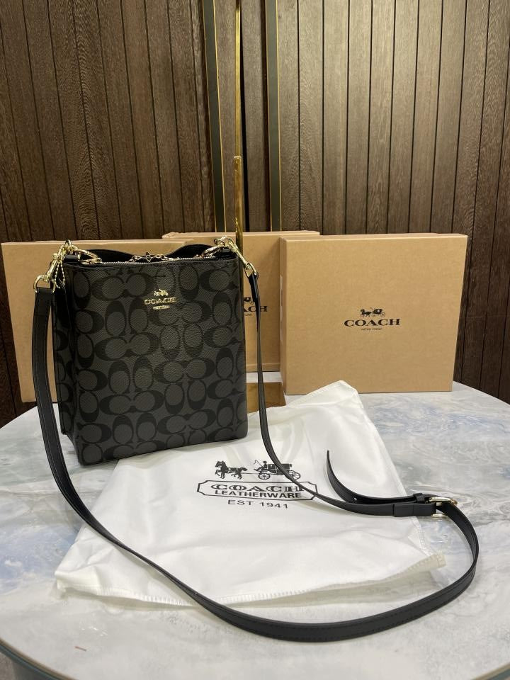 Coac  h mollie signature bucket bag with extra long sling and carry bag & OG box 477