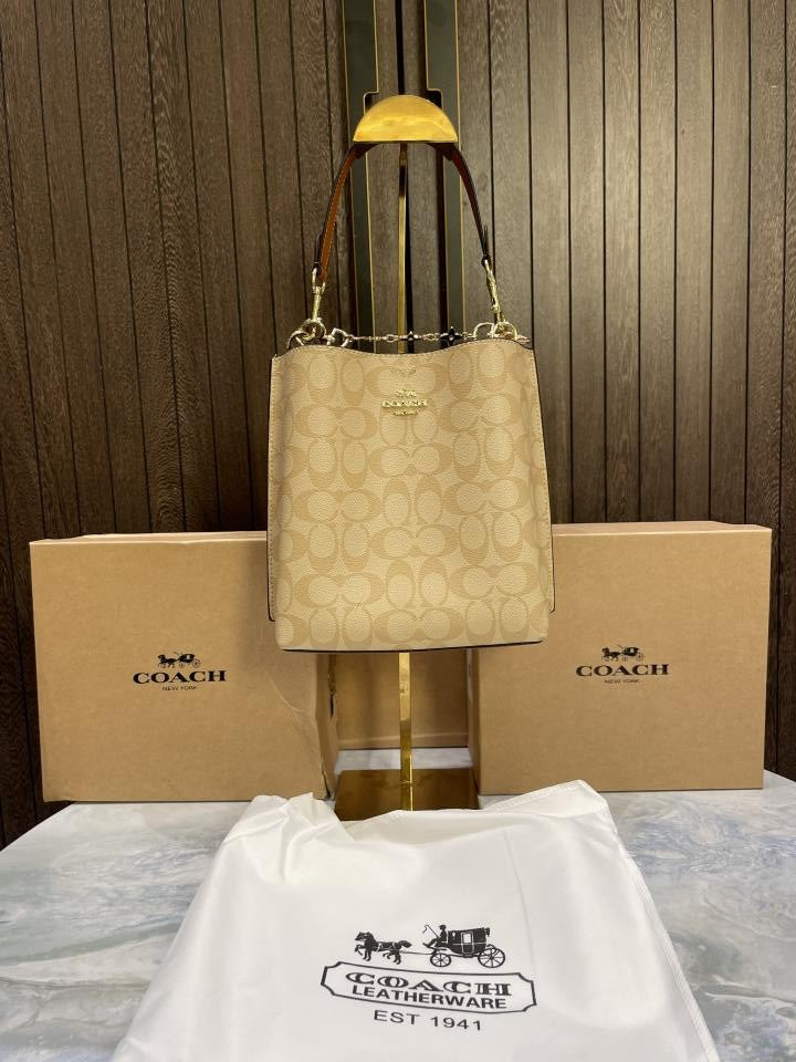 Coac  h mollie signature bucket bag with extra long sling and carry bag & OG box 478