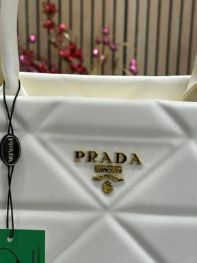 PRAD  A SYMBOLE TOTE WITH DUST BAG PREMIUM QUALITY DONT COMPARE WITH MARKET QUALITY (WHITE)