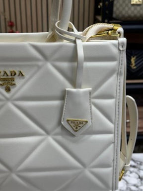 PRAD  A SYMBOLE TOTE WITH DUST BAG PREMIUM QUALITY DONT COMPARE WITH MARKET QUALITY (WHITE)