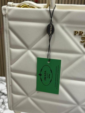 PRAD  A SYMBOLE TOTE WITH DUST BAG PREMIUM QUALITY DONT COMPARE WITH MARKET QUALITY (WHITE)