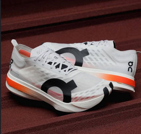 On Cloudboom Strike White Orange