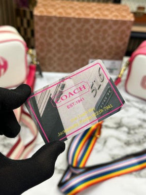 COAC  H RAINBOW SIGNATURE SLING WITH OG BOX AND DUST BAG PREMIUM QUALITY (WHITE PINK) S2795