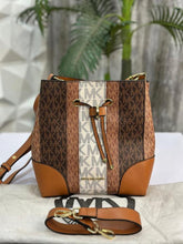 MICHAEL KOR S BUCKET BAG WITH DUST COVER