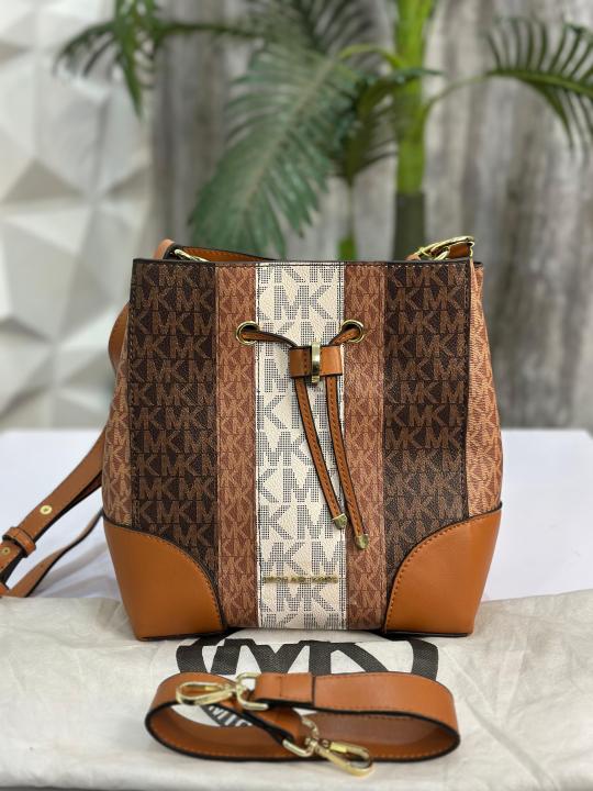 MICHAEL KOR S BUCKET BAG WITH DUST COVER