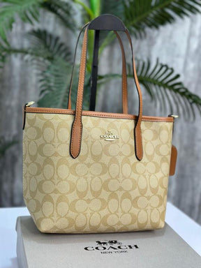 COAC H MINI TOTE WITH OG BOX AND BILLS 1017