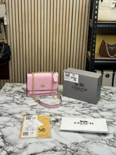COAC  H KLARE EMBOSSED EDITION WITH OG BOX AND DUST BAG (PINK) (S18) DAMAGE BOX