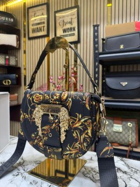 Versace shoulder bag in gold accents with magnetic closure bag (Black and gold)