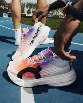 On Cloudboom Strike White Flame with cloud extra insole