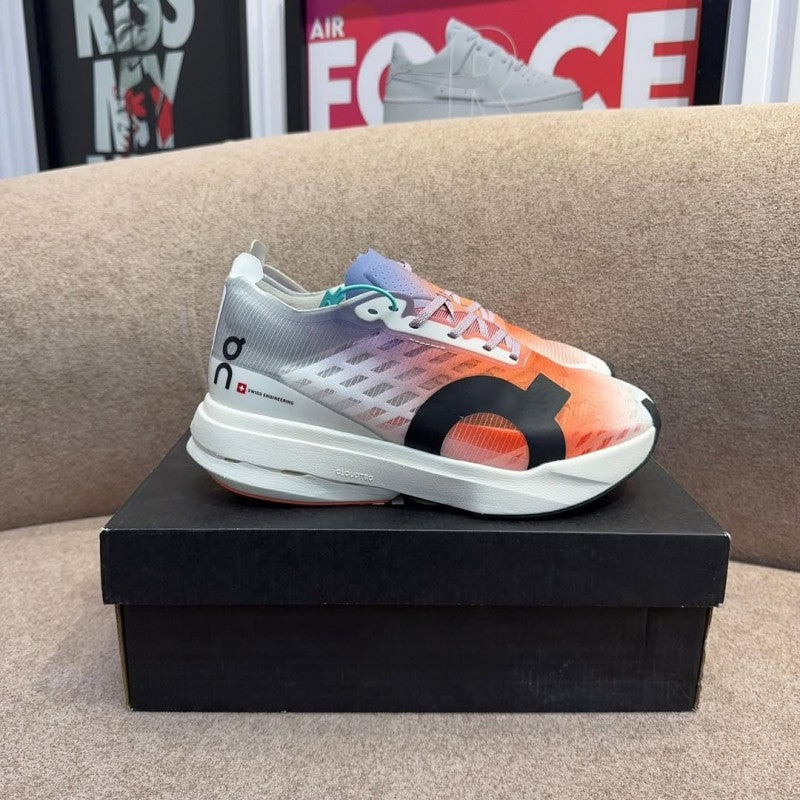 On Cloudboom Strike White Flame with cloud extra insole