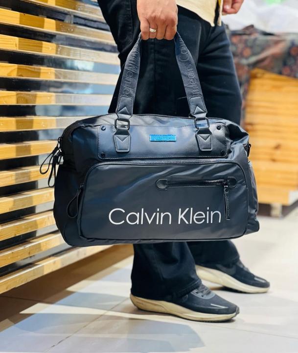 Calvin  klein  duffle  bag  with  dust  bag(C0880)