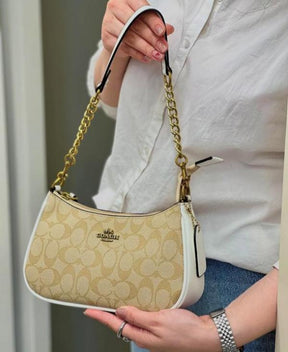 COAC  H Teri Shoulder Bag In Signature Canvas dual belts with og box 188