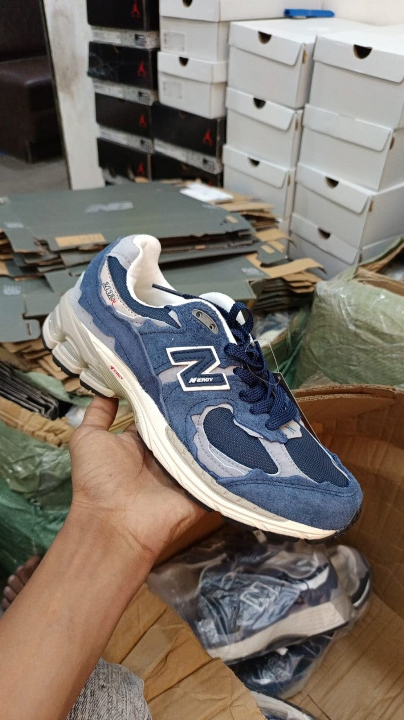 New Balance 2002r protection pack navy grey 221