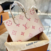 louis vuitton with magnetic box onthego mm monogram empreinte giant bicolour 15