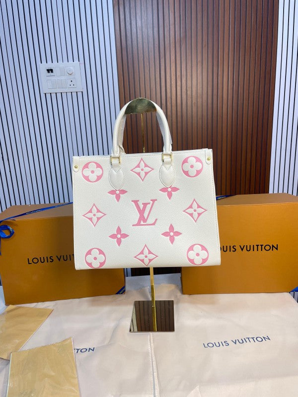 louis vuitton with magnetic box onthego mm monogram empreinte giant bicolour 15