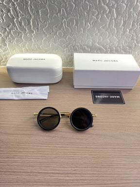 Marc Jacobs daynight changeable glass