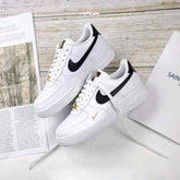 Nik.e Airforce Mini Gold Swoosh
